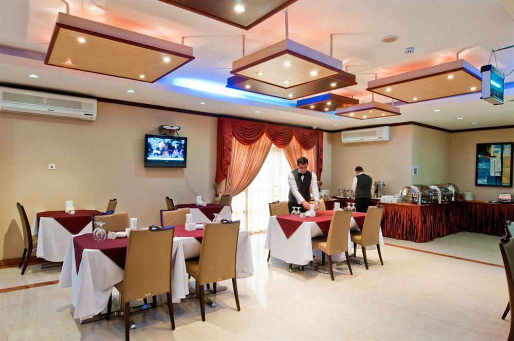 La Villa Palace Hotel Доха Ресторан фото