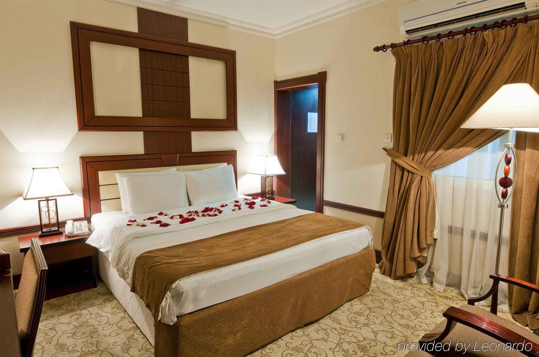 La Villa Palace Hotel Доха Номер фото
